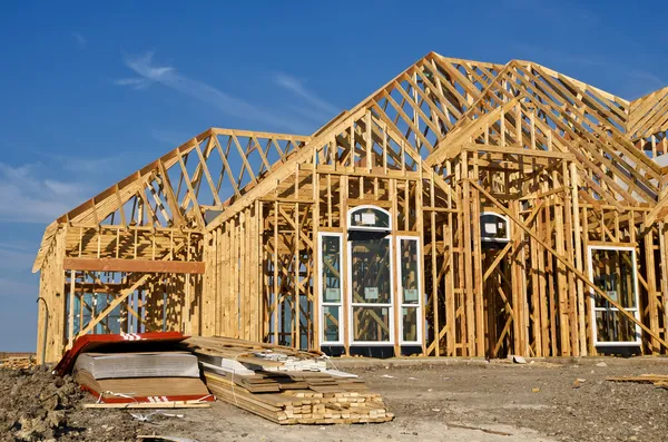 depositphotos_12379738-stock-photo-new-home-construction-framing